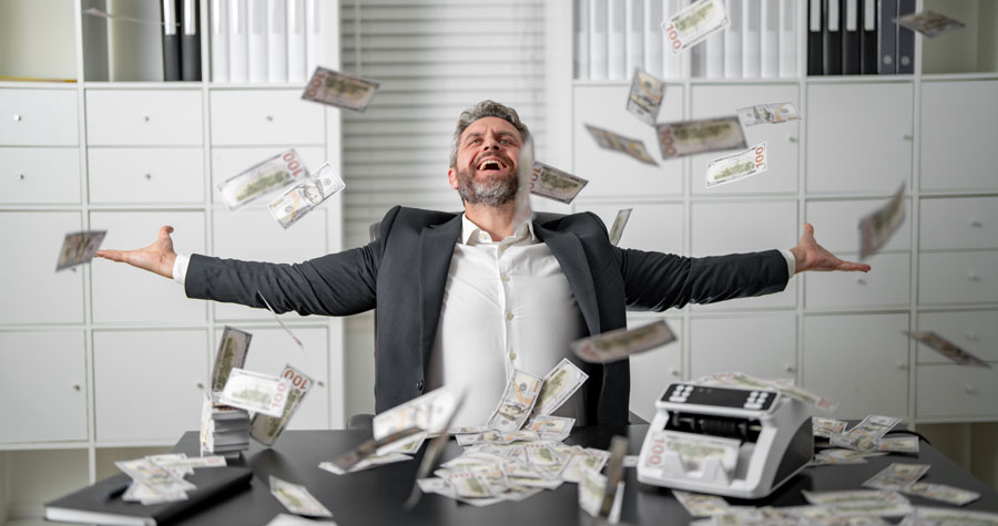 Businessman throwing dollar bills in the air with excitement. Excited man throwing falling cash. Rich business man throwing dollar bills. Handsome man throwing cash while money.