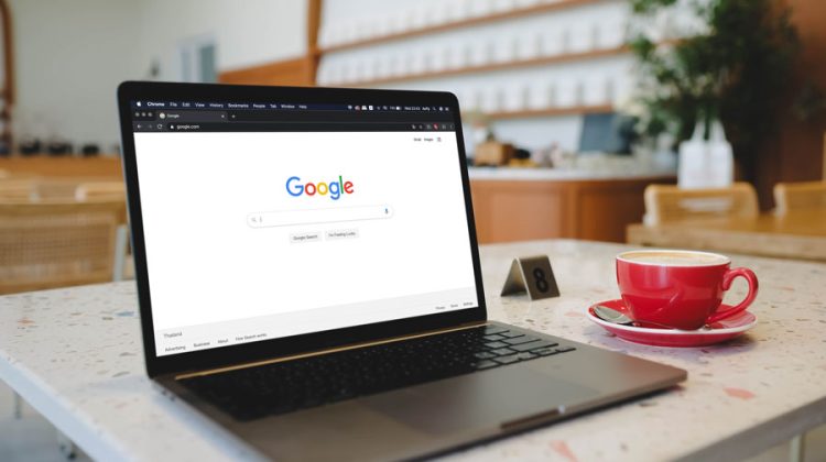 A laptop displaying the Google search page symbolizes how algorithm changes can instantly affect digital visibility.