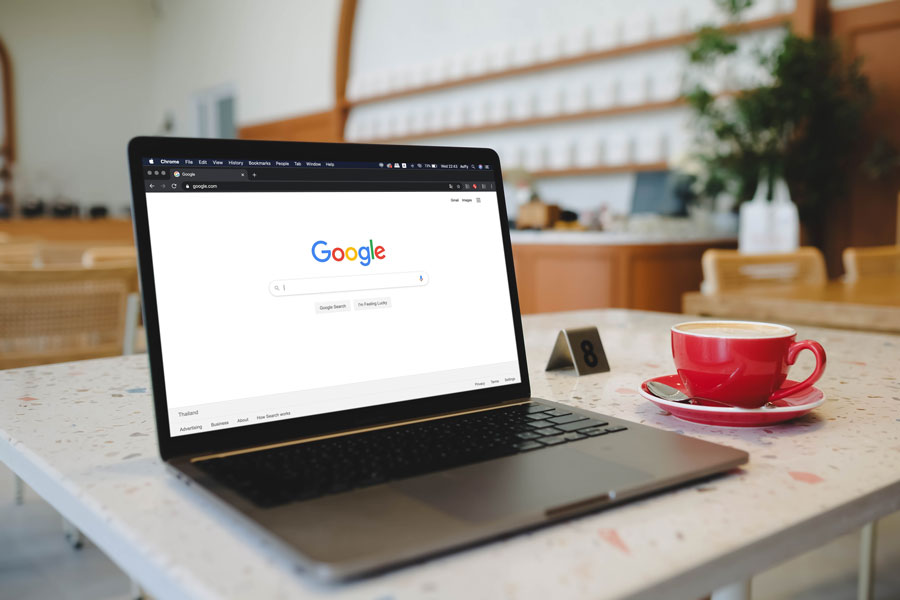 A laptop displaying the Google search page symbolizes how algorithm changes can instantly affect digital visibility.