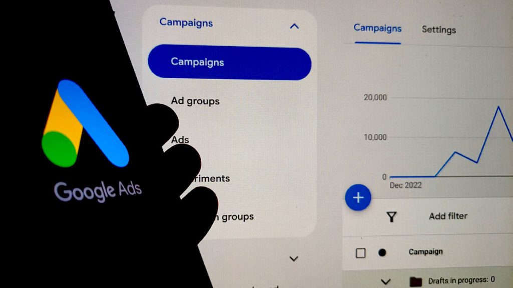 Google Ads logo on smartphone screen with analytics dashboard in background. Concept of PPC, digital marketing, SEO, ad campaign performance, and online advertising United States, May 16, 2025