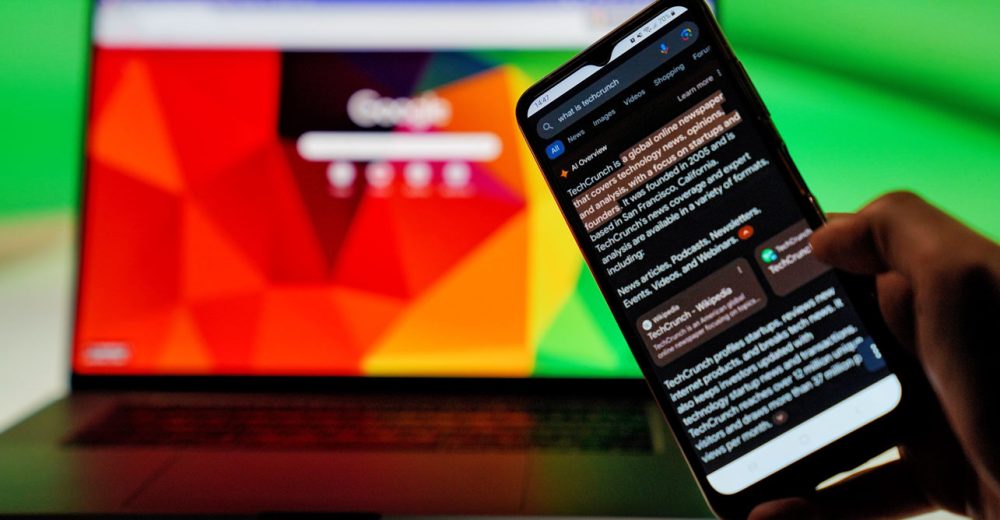 A smartphone displays an AI-generated answer in a search results page, illustrating how businesses are beginning to track what AI tools say about their brands and competitors. That monitoring can help guide efforts to improve their chances of being cited or recommended. Photo: DIA TV.